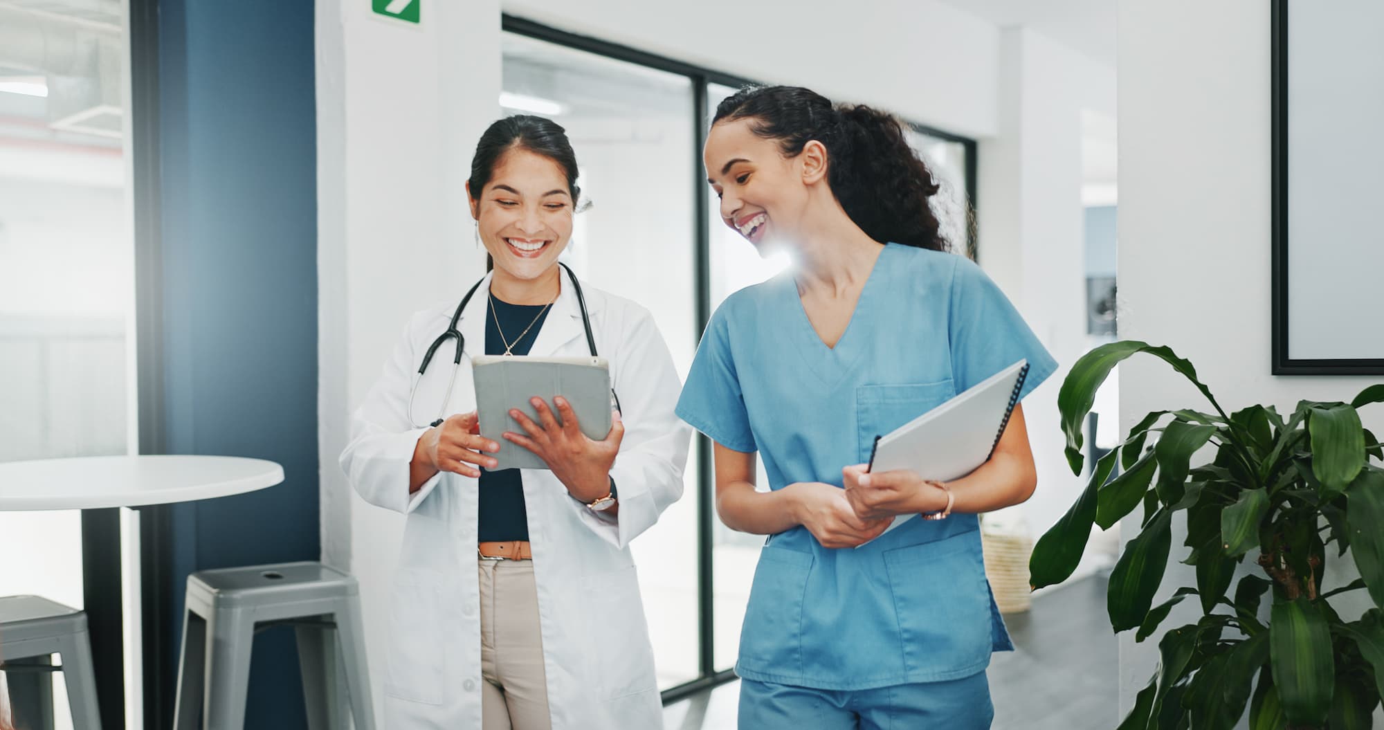 Two healthcare workers smiling